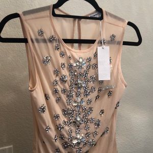Jeweled bodysuit.